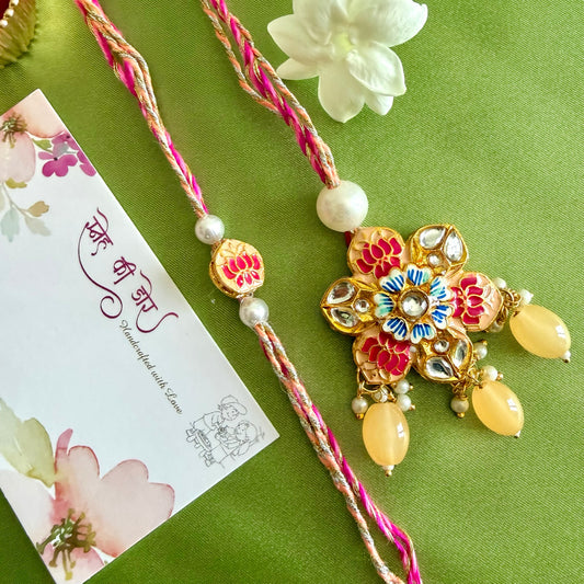 Shimmering Rakhi set for Bhaiya-Bhabhi