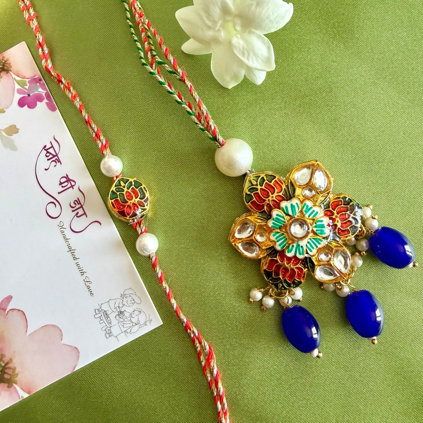 Shimmering Rakhi set for Bhaiya-Bhabhi
