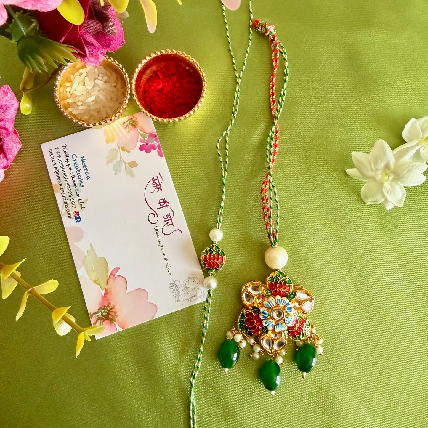 Shimmering Rakhi set for Bhaiya-Bhabhi