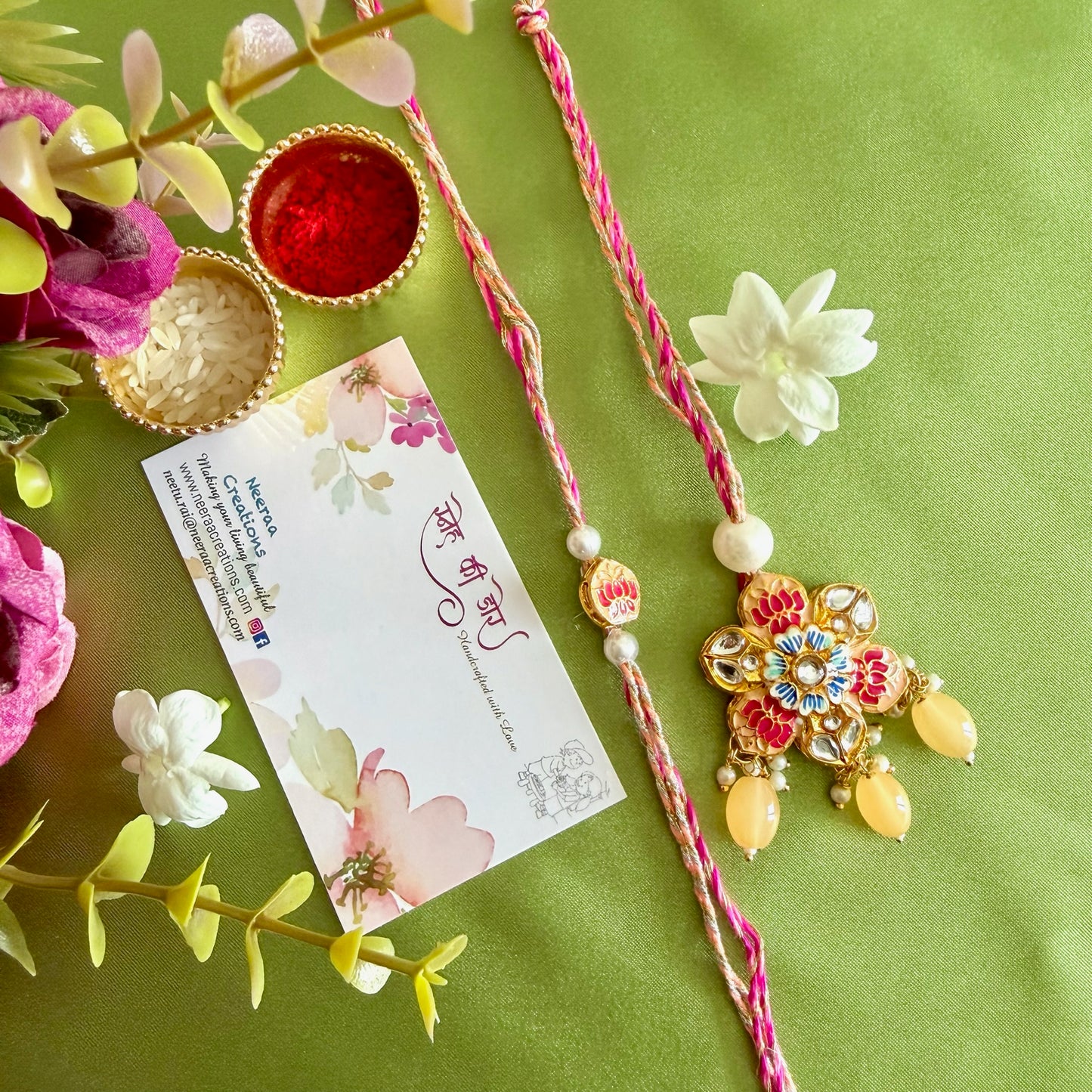 Shimmering Rakhi set for Bhaiya-Bhabhi