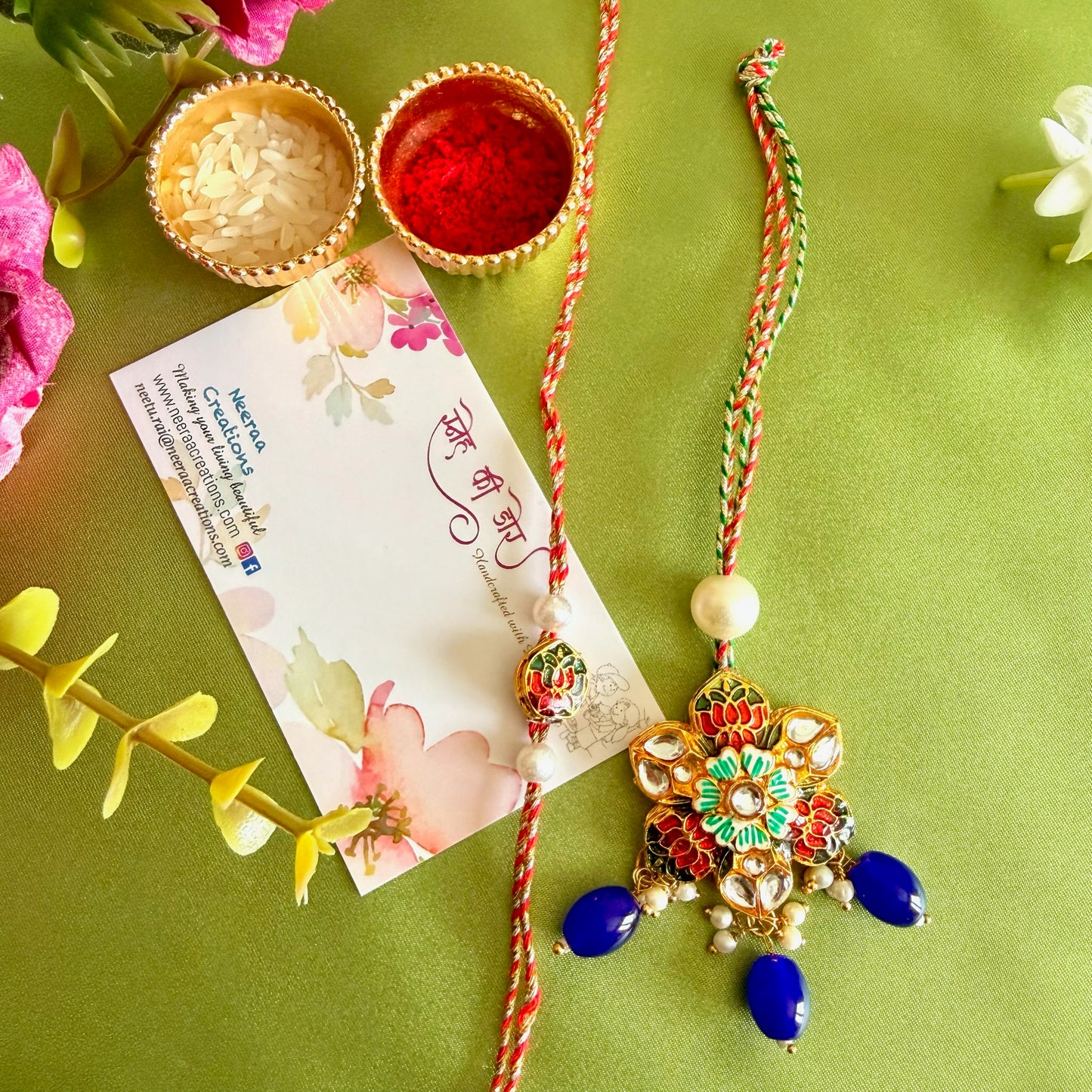Shimmering Rakhi set for Bhaiya-Bhabhi